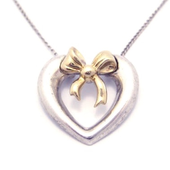Tiffany & Co. Jewelry - Tiffany & Co. heart and bow 18k (750) SS (925)